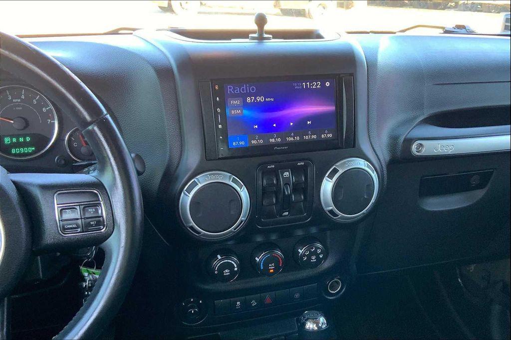 used 2015 Jeep Wrangler Unlimited car, priced at $21,650
