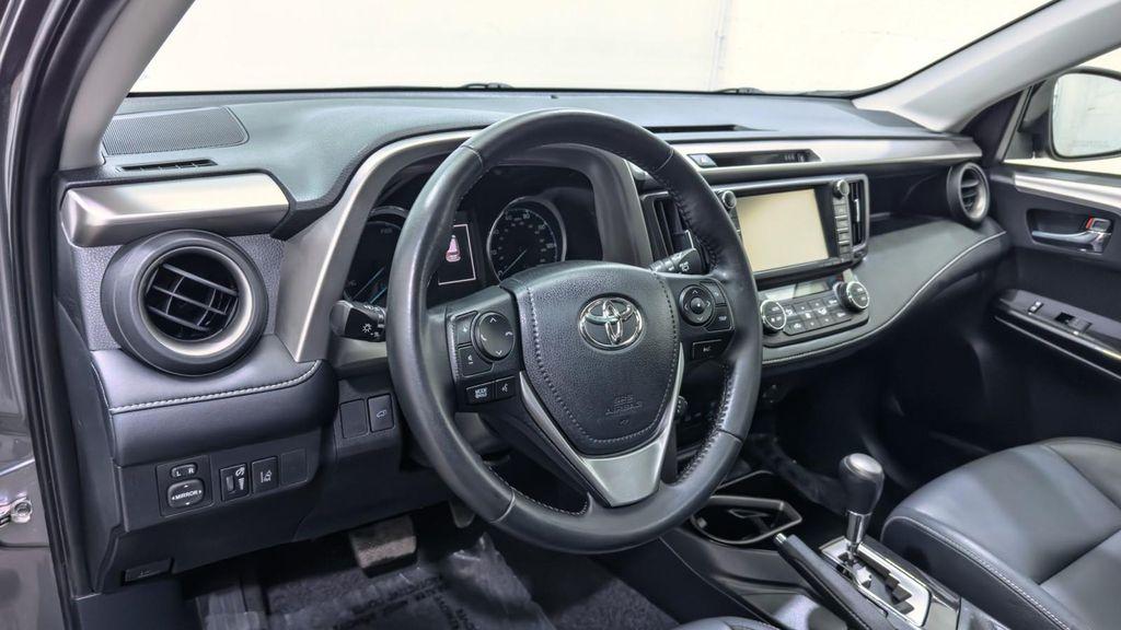 used 2018 Toyota RAV4 Hybrid car, priced at $21,295