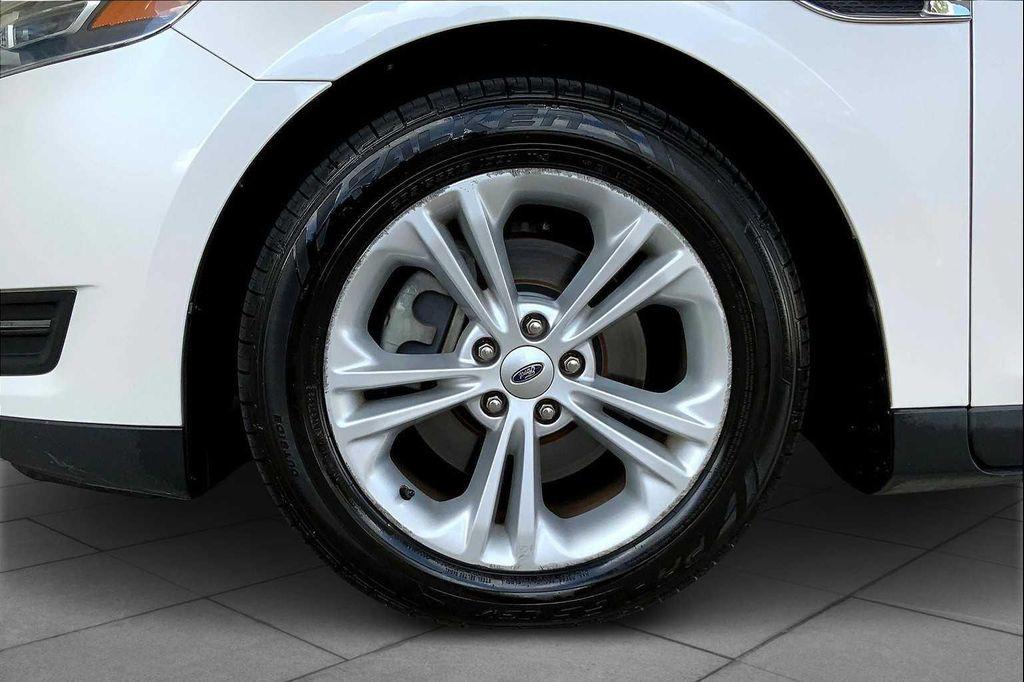 used 2015 Ford Taurus car, priced at $12,950