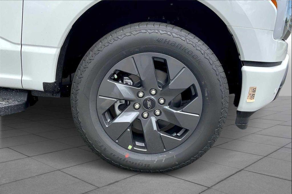 new 2025 Ford F-150 Lightning car, priced at $73,940