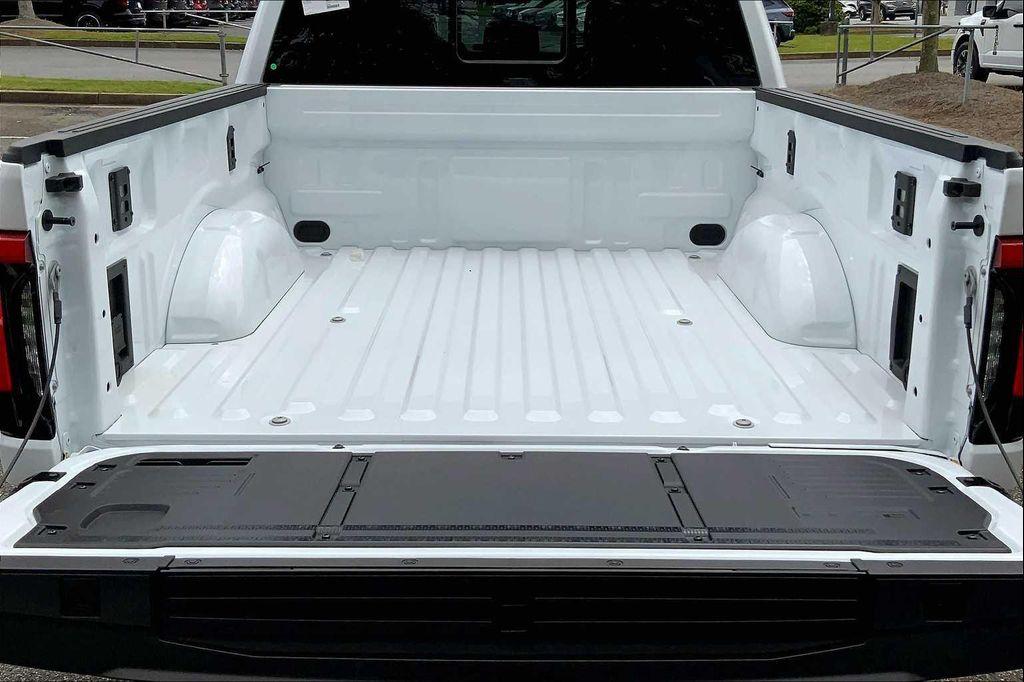 new 2025 Ford F-150 Lightning car, priced at $73,940