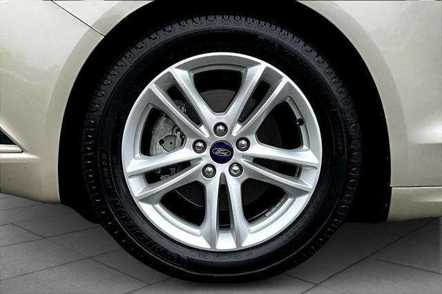 used 2018 Ford Fusion car, priced at $13,999