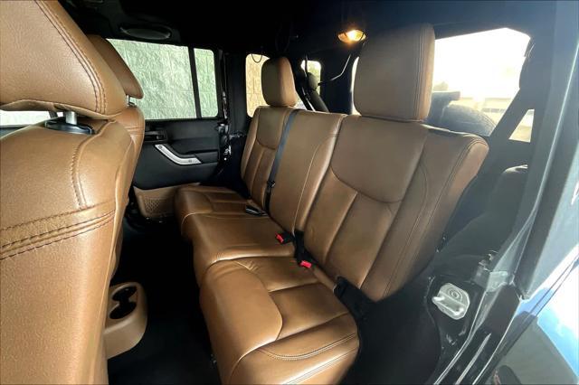used 2013 Jeep Wrangler Unlimited car, priced at $15,900