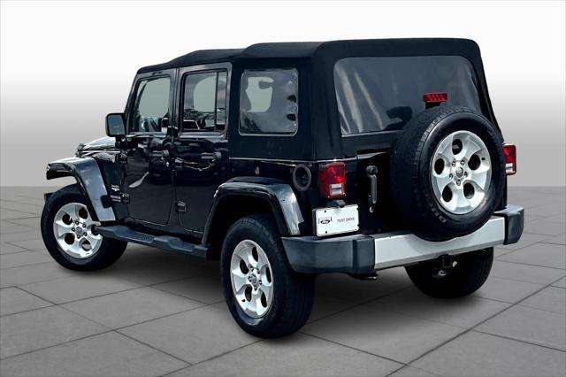 used 2013 Jeep Wrangler Unlimited car, priced at $15,900