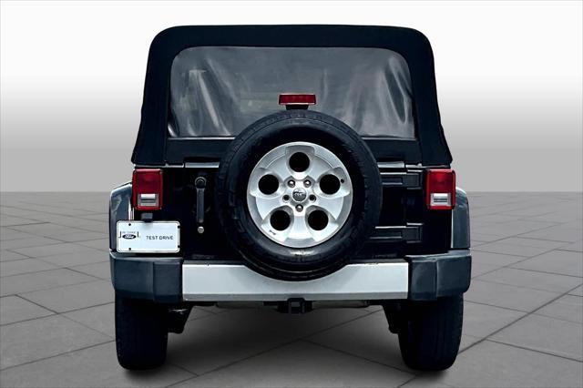 used 2013 Jeep Wrangler Unlimited car, priced at $15,900