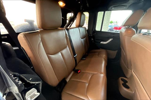 used 2013 Jeep Wrangler Unlimited car, priced at $15,900