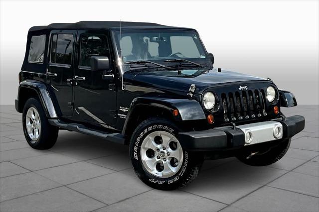 used 2013 Jeep Wrangler Unlimited car, priced at $15,900