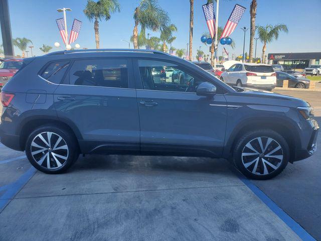 used 2023 Volkswagen Taos car, priced at $20,577