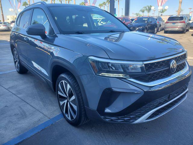 used 2023 Volkswagen Taos car, priced at $20,577