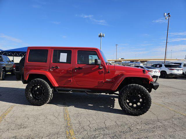 used 2014 Jeep Wrangler Unlimited car, priced at $20,495