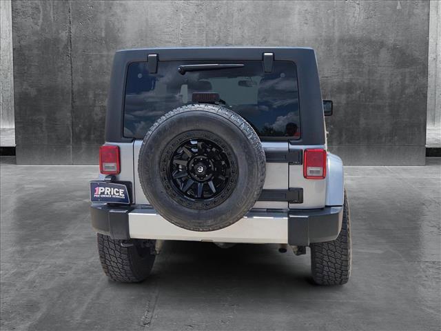 used 2013 Jeep Wrangler Unlimited car, priced at $18,495