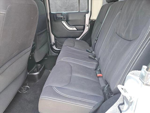 used 2013 Jeep Wrangler Unlimited car, priced at $18,495
