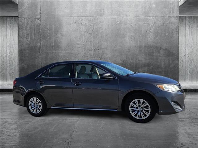 used 2014 Toyota Camry car, priced at $13,880