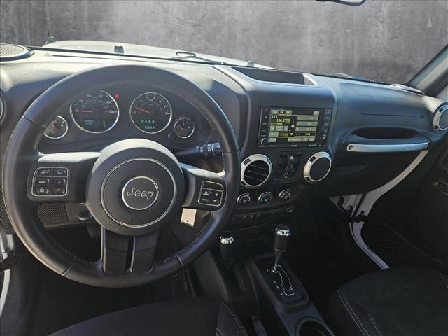 used 2016 Jeep Wrangler Unlimited car, priced at $19,402