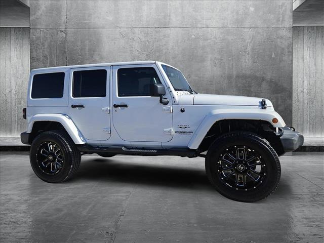 used 2016 Jeep Wrangler Unlimited car, priced at $19,402