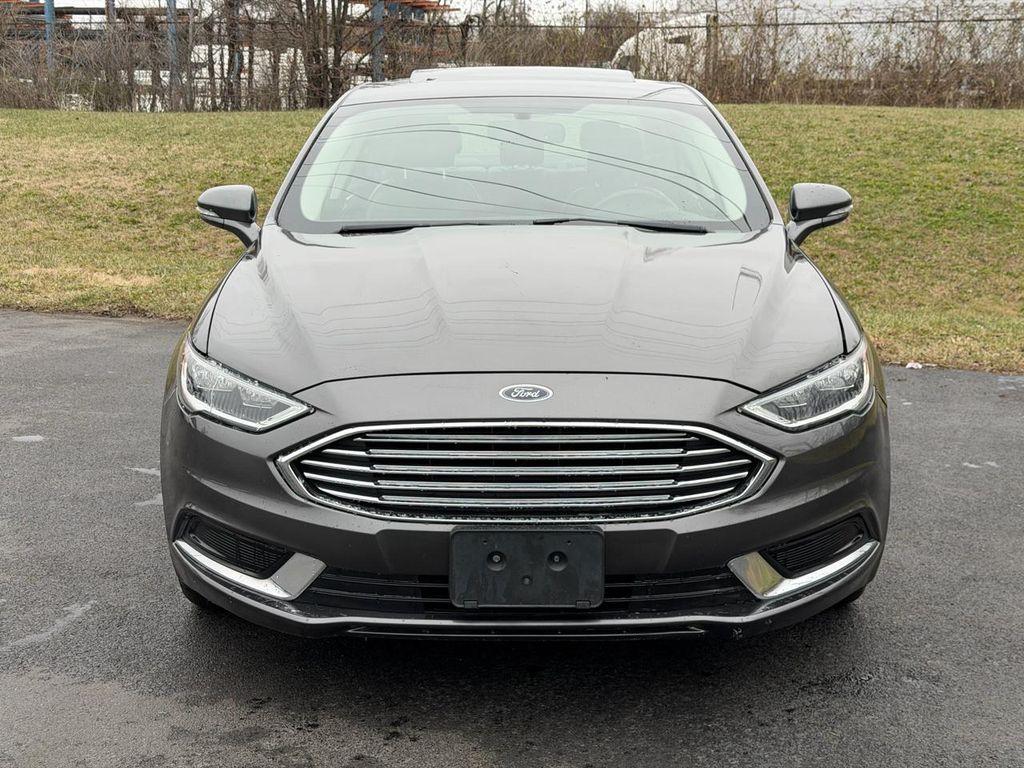 used 2018 Ford Fusion car, priced at $10,490