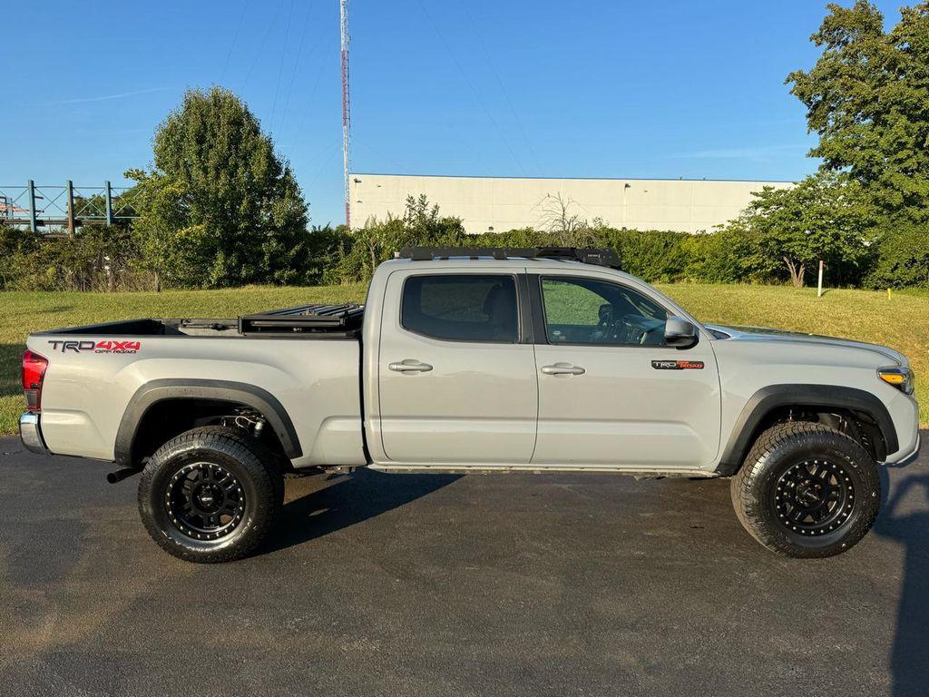 used 2018 Toyota Tacoma car, priced at $29,686