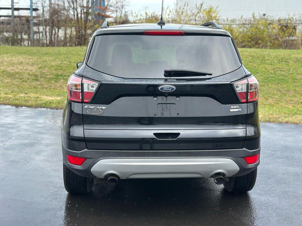 used 2018 Ford Escape car, priced at $11,490