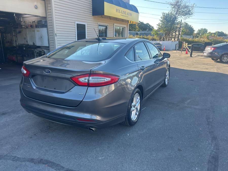used 2014 Ford Fusion car, priced at $7,995