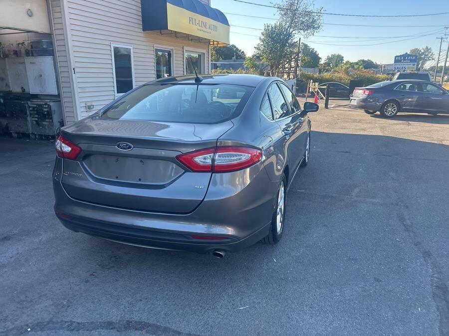 used 2014 Ford Fusion car, priced at $7,995