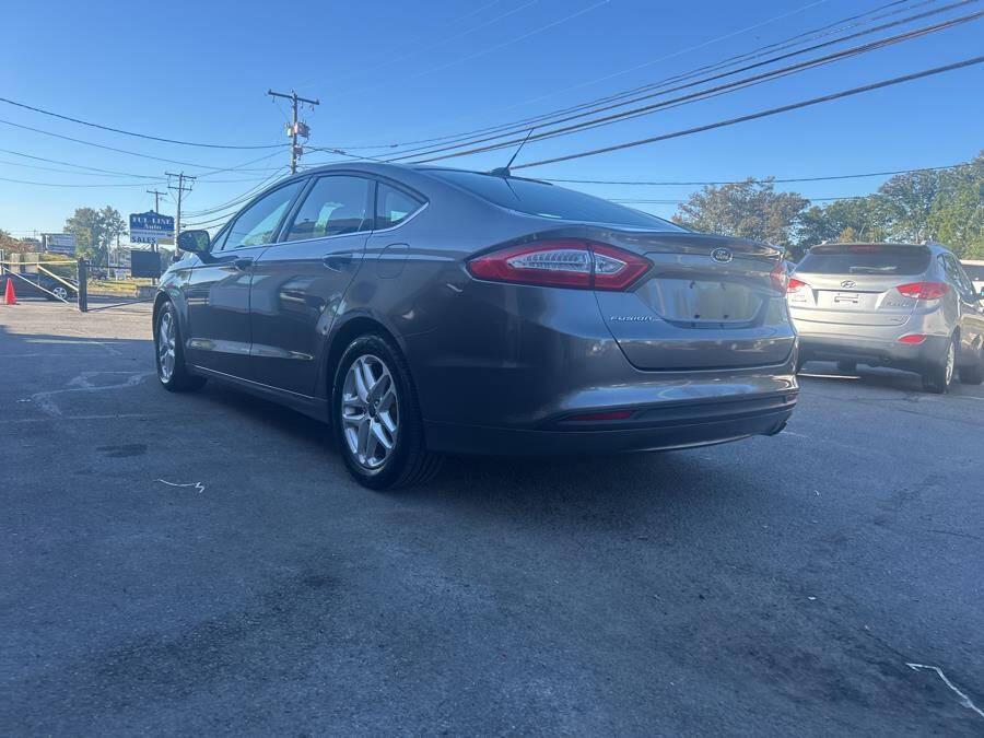used 2014 Ford Fusion car, priced at $7,995