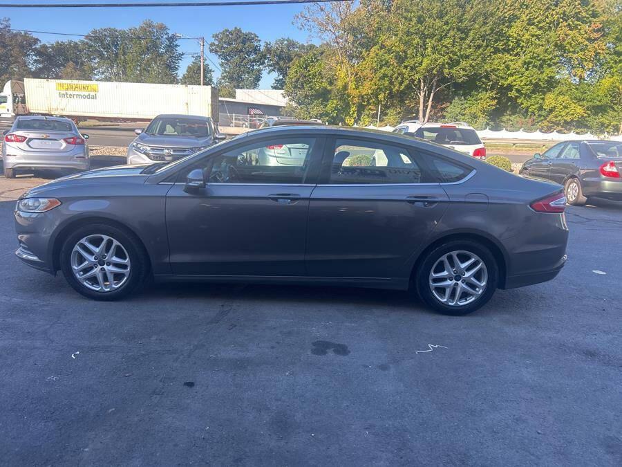 used 2014 Ford Fusion car, priced at $7,995