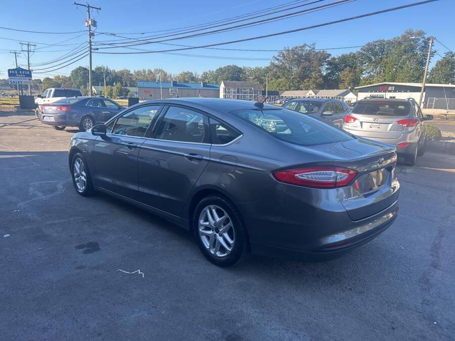 used 2014 Ford Fusion car, priced at $7,995