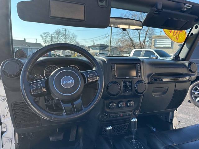used 2012 Jeep Wrangler Unlimited car, priced at $15,998