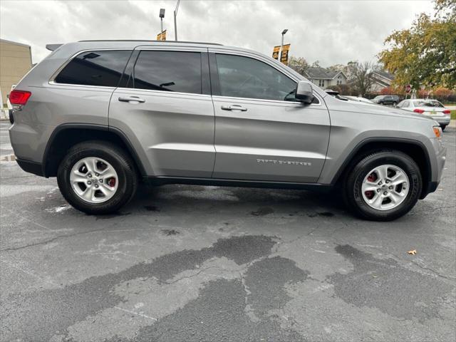 used 2014 Jeep Grand Cherokee car, priced at $9,998