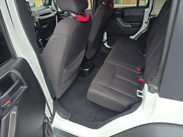 used 2014 Jeep Wrangler Unlimited car, priced at $16,995