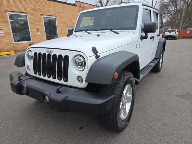 used 2014 Jeep Wrangler Unlimited car, priced at $16,995