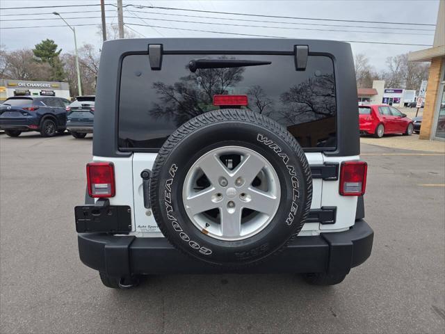 used 2014 Jeep Wrangler Unlimited car, priced at $16,995