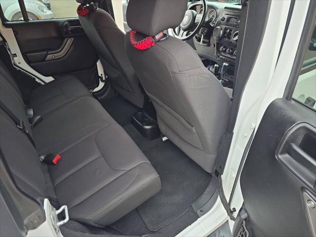used 2014 Jeep Wrangler Unlimited car, priced at $16,995
