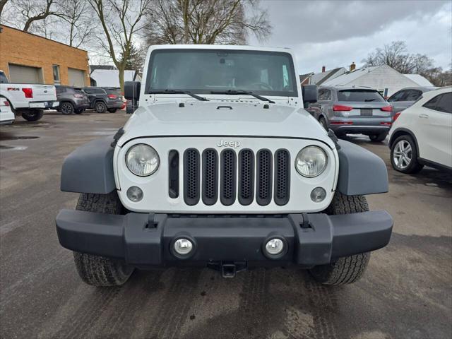 used 2014 Jeep Wrangler Unlimited car, priced at $18,495