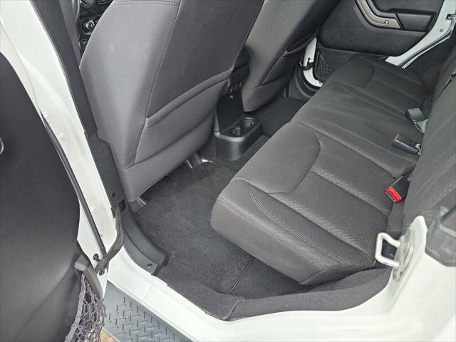 used 2014 Jeep Wrangler Unlimited car, priced at $18,495