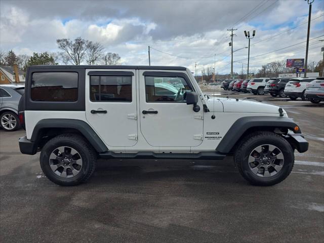 used 2014 Jeep Wrangler Unlimited car, priced at $18,495