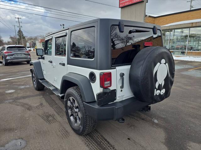 used 2014 Jeep Wrangler Unlimited car, priced at $18,495