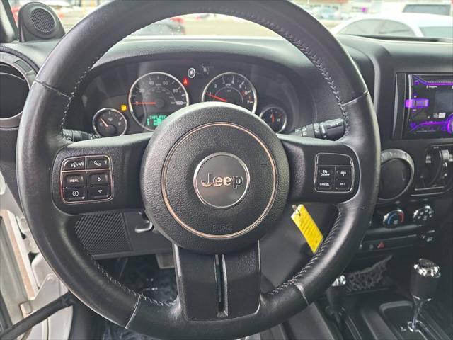 used 2014 Jeep Wrangler Unlimited car, priced at $18,495