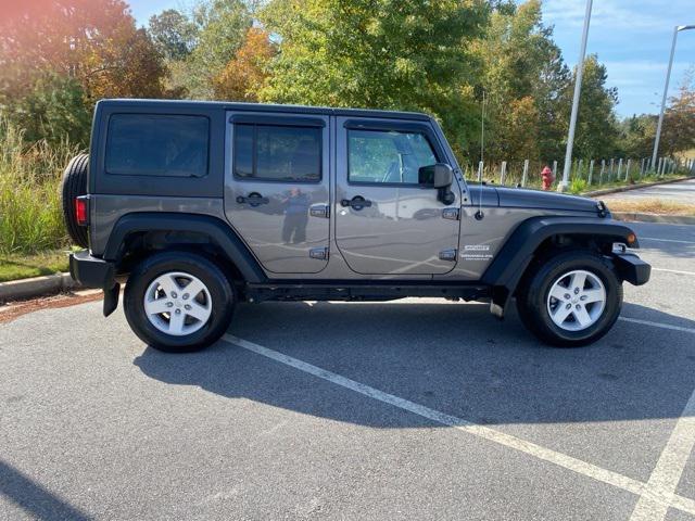 used 2017 Jeep Wrangler Unlimited car, priced at $27,381