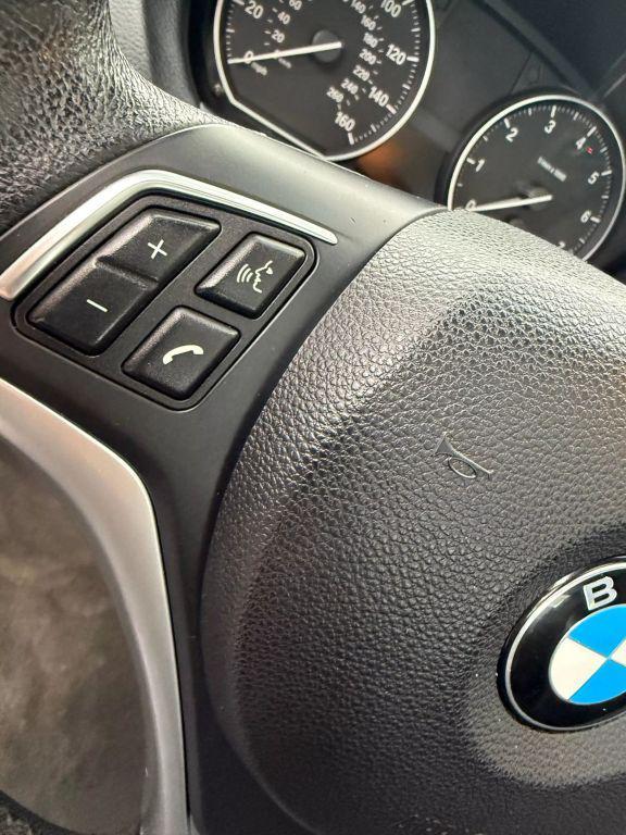 used 2013 BMW 128 car, priced at $9,999