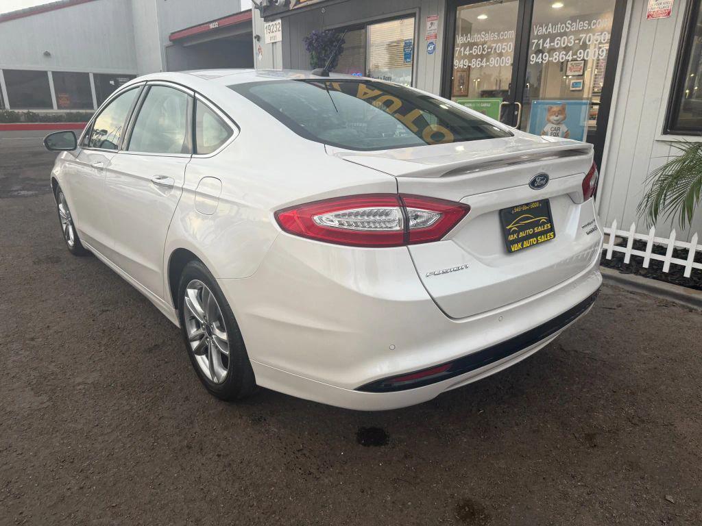 used 2015 Ford Fusion Hybrid car, priced at $9,999