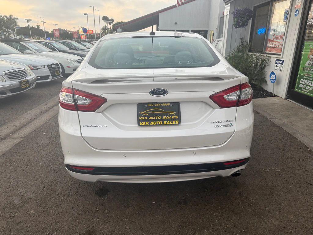used 2015 Ford Fusion Hybrid car, priced at $9,999