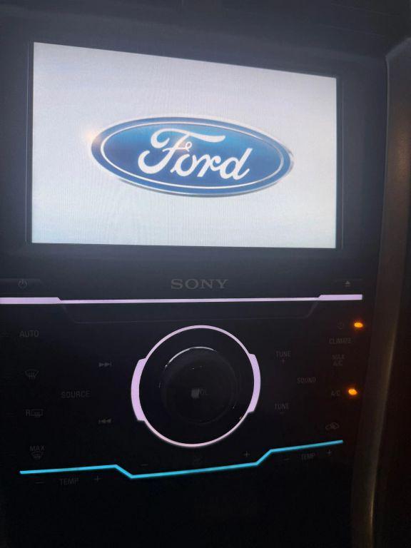 used 2015 Ford Fusion Hybrid car, priced at $9,999