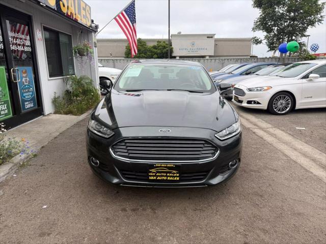 used 2015 Ford Fusion Hybrid car, priced at $10,999