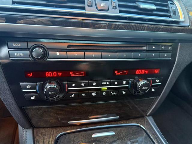 used 2011 BMW 750 car, priced at $11,999
