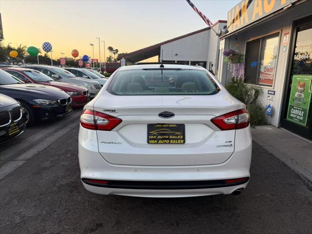 used 2013 Ford Fusion Hybrid car, priced at $9,999