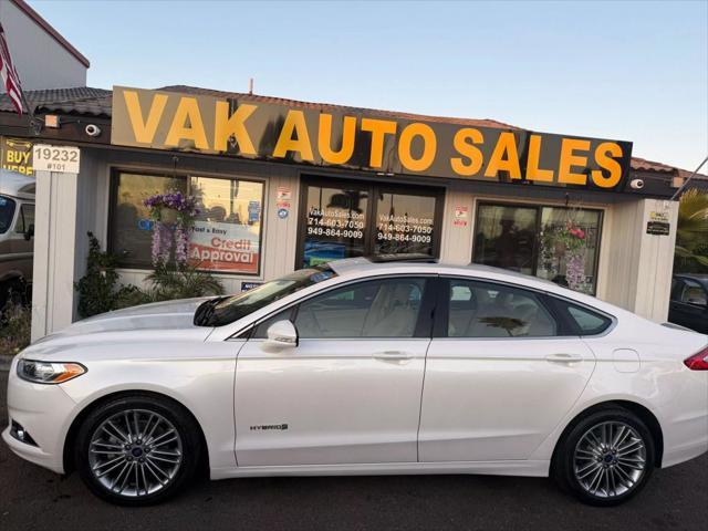 used 2013 Ford Fusion Hybrid car, priced at $9,999