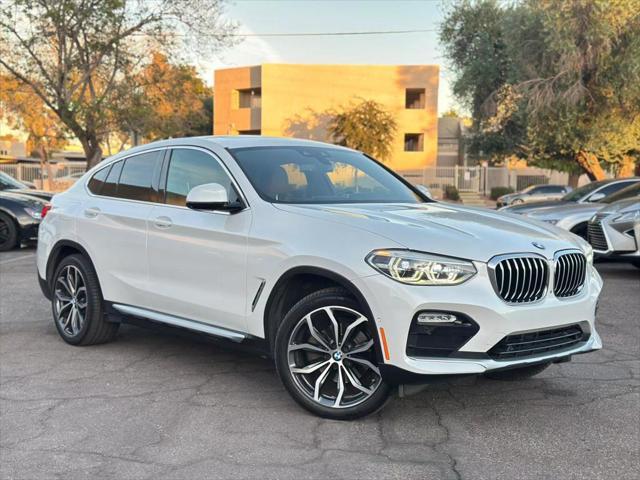 used 2019 BMW X4 car, priced at $26,500