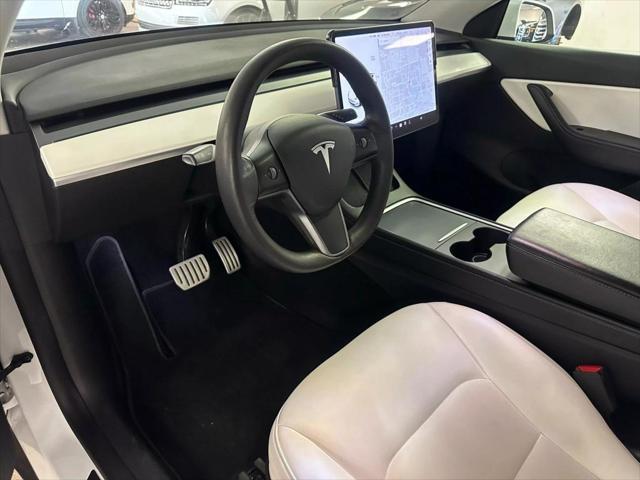 used 2021 Tesla Model Y car, priced at $28,900