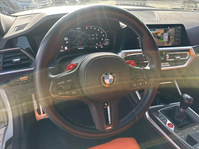 used 2022 BMW M4 car, priced at $64,950